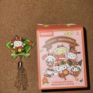 Sanrio Characters Badge with Green and Pink Accents